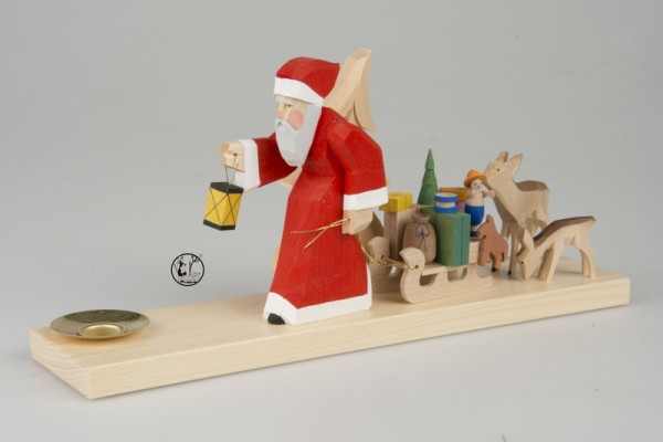 Holzschnitzerei Kerzenhalter Weihnachtsmann auf Schlitten 12 cm von Bettina Franke