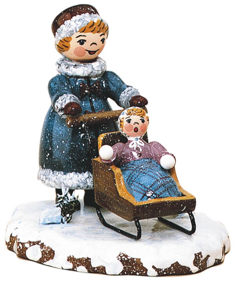 Miniature winter child girl with children's sledge by Hubrig Volkskunst